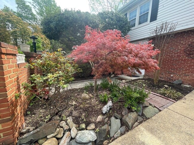 Building Photo - A fully updated Four Bedroom, Three and On...
