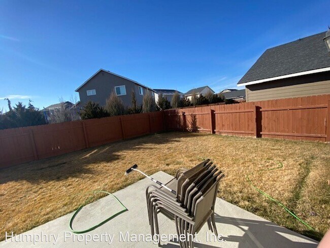 Building Photo - 4 br, 2.5 bath House - 9859 W. Littlewood St.