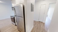 Located at 535-555 Shaw Ave in Coquitlam, BC, this well-appointed two-bedroom, one-bathroom unit offers a thoughtfully designed single-floor layout with a clean, contemporary aesthetic. Light-toned laminate flooring runs consistently throughout the space, complementing the crisp white walls and creating a bright, cohesive feel across every room.

The generously sized primary bedroom features a large sliding-door closet, a window with pleasant views of surrounding greenery, and baseboard heating — providing both comfort and practicality. The second bedroom is equally well-sized, featuring a built-in double closet with panel doors and direct access to the hallway, making it versatile for various uses.

The bathroom is finished with classic white subway tile lining the tub and shower surround, paired with chrome fixtures and a full soaking tub — a timeless and easy-to-maintain design. The layout is efficiently organized, with a central hallway connecting the key rooms for smooth circulation throughout the unit.

The open living area is spacious and filled with natural light, supported by baseboard heating and neutral white walls that offer a blank canvas for personalization. The overall ambiance is clean, modern, and move-in ready, making this unit a practical and attractive option in the Coquitlam area.