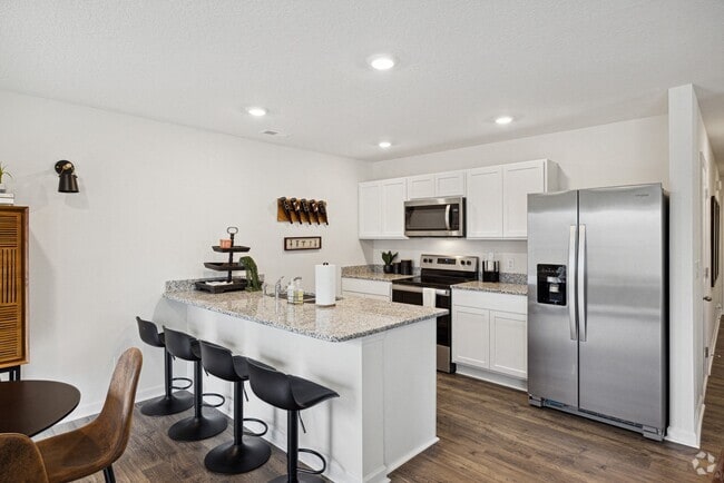 Building Photo - The Summit Townhomes