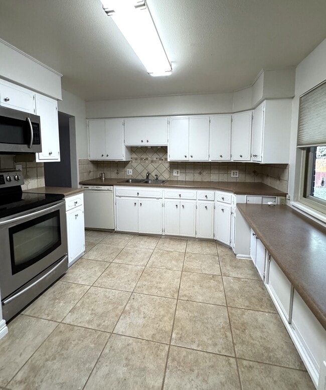 Building Photo - 3084 S Xanthia St