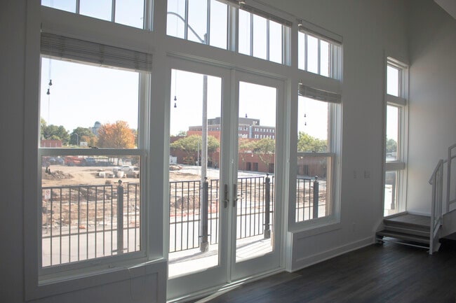 Large windows leading to private balcony - 318 E 6th St