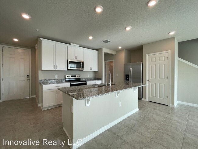 Building Photo - 3 br, 2.5 bath House - 1057 Desert Candle Dr.
