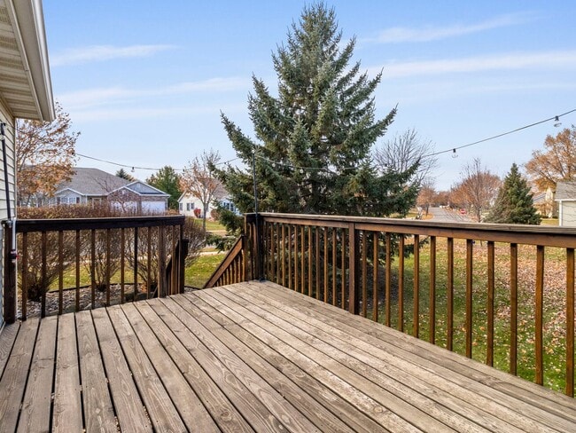 Building Photo - Spacious 3BR/3BA Condo with Finished Basement + 2-Car Garage — Available Now