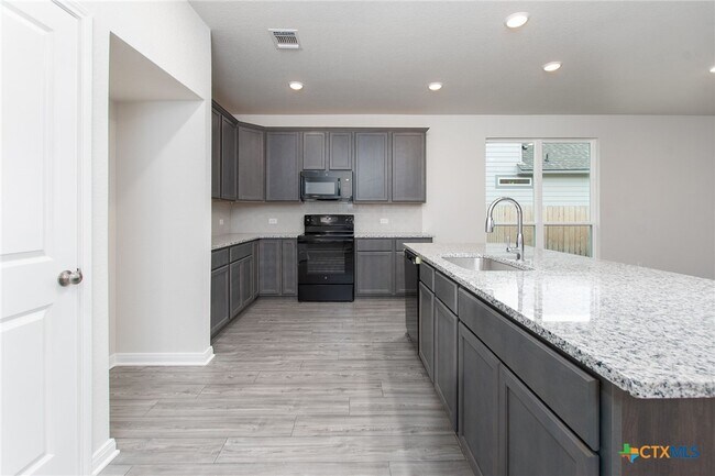 Foto del edificio - 9806 Kensley Rose Dr