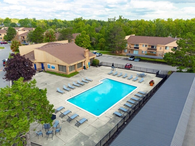 Sparkling Swimming Pool and Sun Deck at Franklin River Apartments in Southfield, MI - Franklin River Apartments