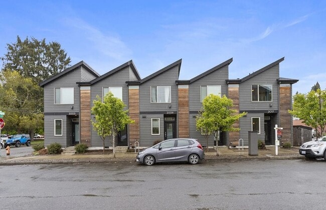 Building Photo - Dual Masters! Stunning Modern End-Unit Townhome in Buckman Bright, Airy & Designed for Comfort