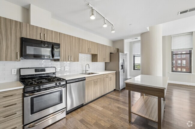 2 habitaciones, 2.5 baños - 1,738 pies cuadrados - Cocina - Spectra at Sibley Square