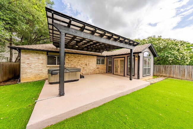 Building Photo - Hot Tub - CHECK. Turf - CHECK. Corner Home...