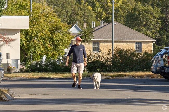 Woods Park residents take advantage of the great summer weather by walking at the local parks.