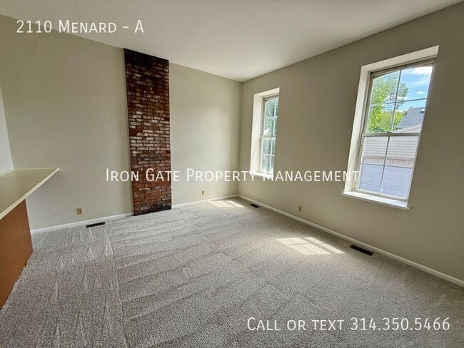 Building Photo - 2110 Menard-A