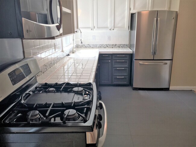 Foto del edificio - Beautiful 4 Bedroom Juanita Gem Walking Di...