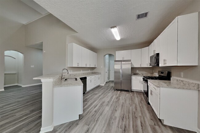 Foto del edificio - 8618 Cedar Walk Dr