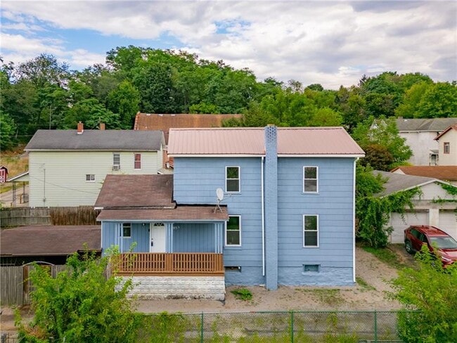 Building Photo - 305 1/2 E Lutton St