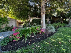 Building Photo - 10233 De Soto Ave