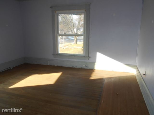 Building Photo - 4 br, 2 bath House - 310 W 10th St B Unit B