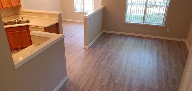 Building Photo - Enjoy virtually maintenance free living in...
