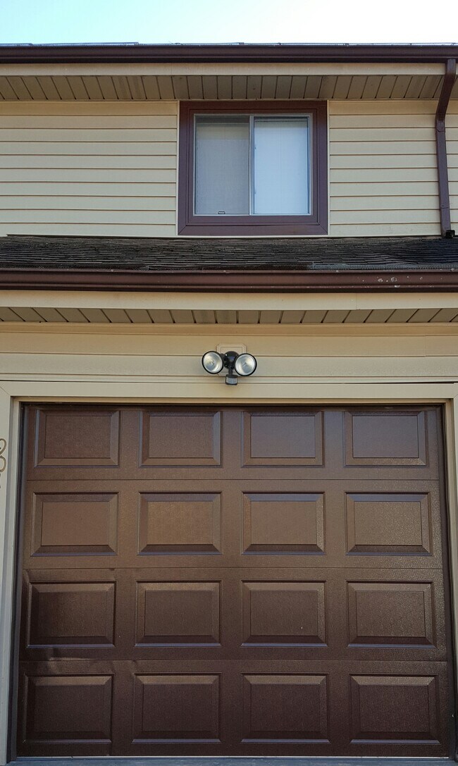 Garage with Security Light - 906 Sundown Dr