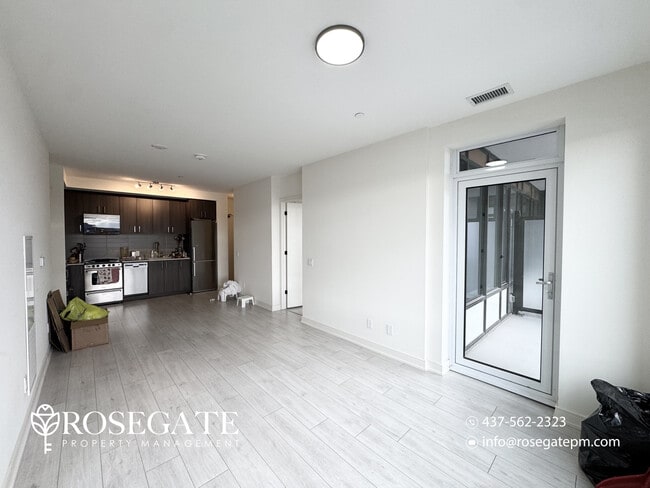Building Photo - Modern 2-Bedroom + Den Condo with Balcony,...