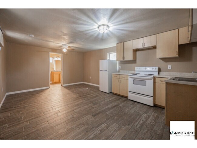 Building Photo - Welcome to this Charming and Spacious Stud...