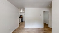 Located at 340 Dixie Hills Circle in Atlanta, GA, this efficient single-floor unit offers a well-organized layout comprising one bedroom, one bathroom, and a kitchen. Warm wood-look vinyl plank flooring flows consistently throughout the space, complementing the clean white walls and bright baseboards that give the interior a fresh, move-in-ready appearance.

The kitchen is thoughtfully appointed with white shaker-style cabinetry, light countertops, a classic white subway tile backsplash, and a stainless refrigerator. A window above the counter area allows natural light to fill the space, enhancing its open and airy feel.

The bedroom is a cozy, well-proportioned room featuring a window that frames views of surrounding greenery, providing both natural light and a calm atmosphere. A six-panel white door leads to an adjacent closet, offering practical storage.

The bathroom features full white square tile surround on the walls, a soaking bathtub, and a window that introduces additional natural light and ventilation — a functional and clean space overall.

The dollhouse view confirms a compact but efficiently organized floor plan where each room is clearly defined and easily accessible. This unit is ideal for those seeking a straightforward, low-maintenance living space in Atlanta.