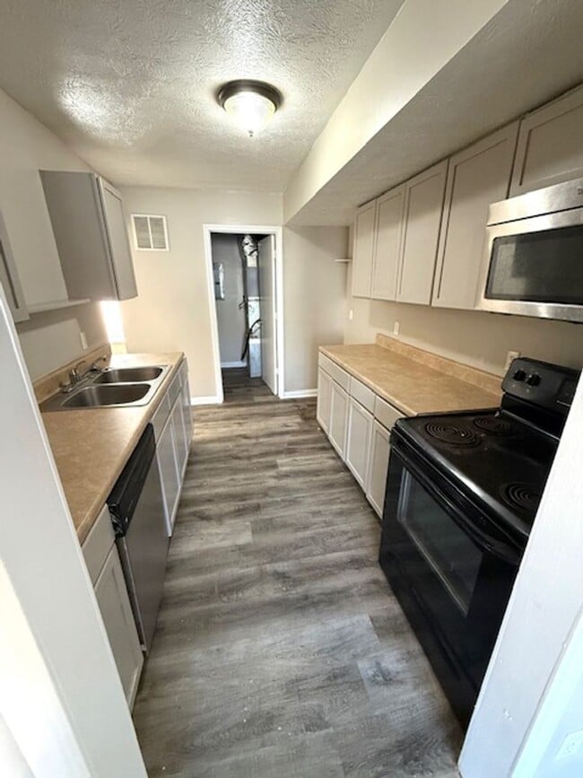 Photo - 3 Bedrooms with 1 - 1/2 Baths House