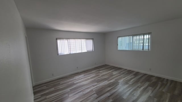 bedroom with laminate - 1823 W Bay Ave