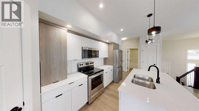 Photo du bâtiment - 13002-13106 106 St