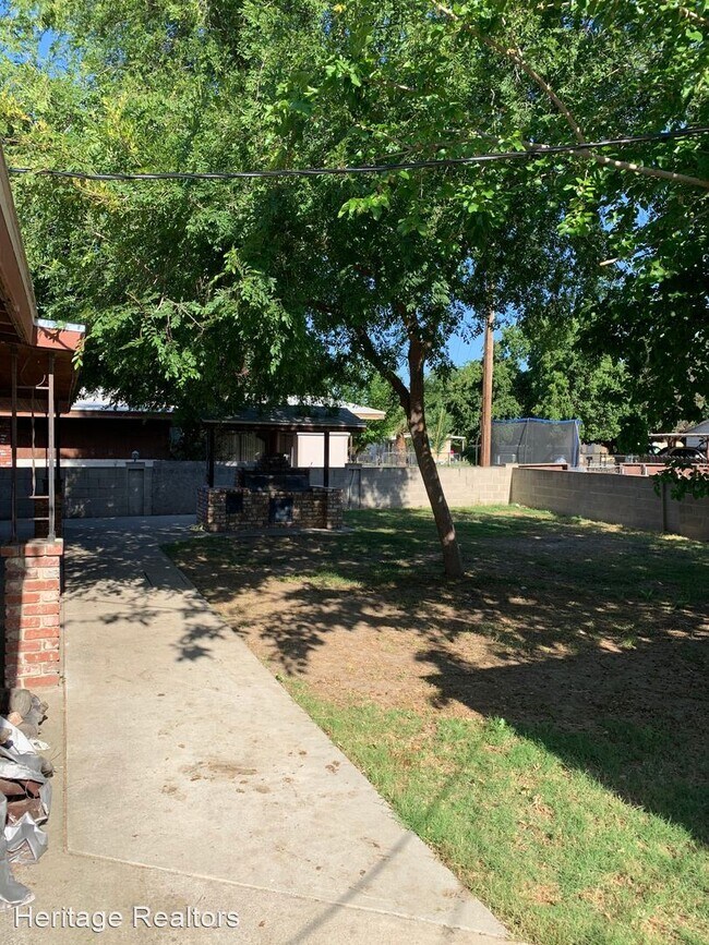 Building Photo - 3 br, 2 bath House - 9726 Garden Dr