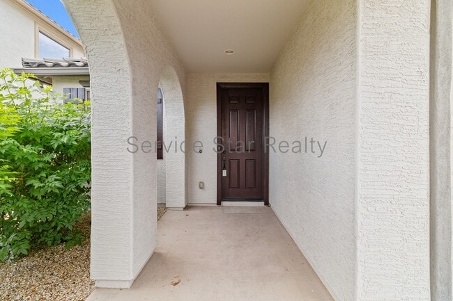 Building Photo - 9031 W San Juan Ave