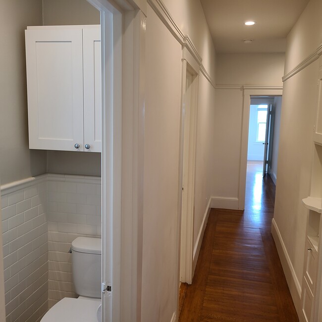 Hallway and 1/2 bathroom - 440 34th Ave