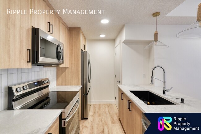 Photo du bâtiment - Modern 2 Beds, 1 Baths TownHouse | 2 Pets ...