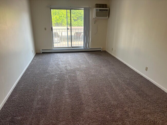 Sala de estar - Clearview Apartments