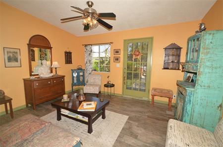 Living Room - porcelain tile floors that look like wood - 4714 W 159th St