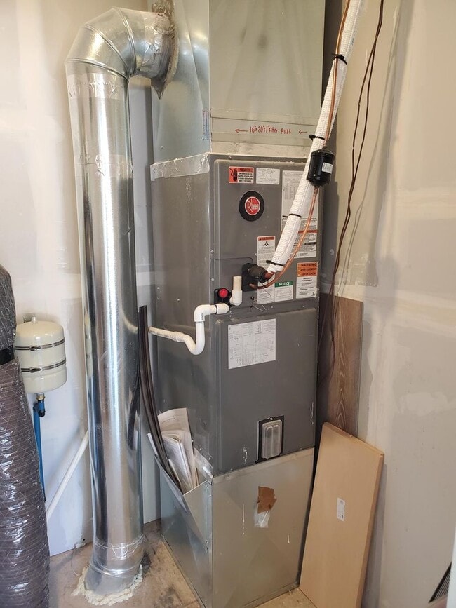 Building Photo - Brand New Zero Step Duplex in Deer Park