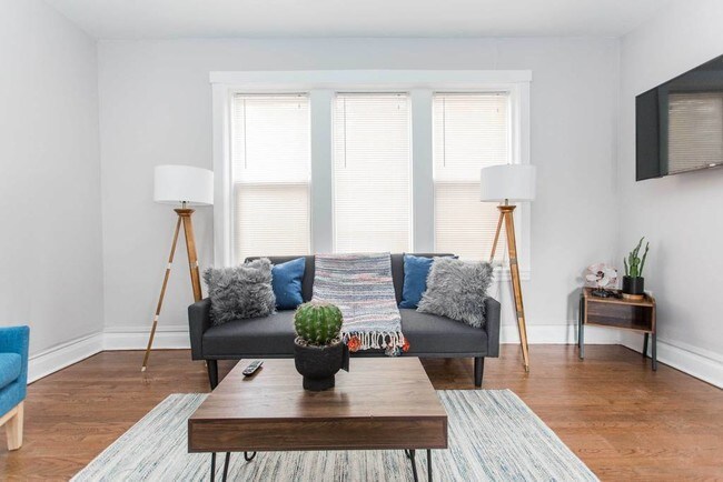 Spacious living room features natural light - 3819 w George st