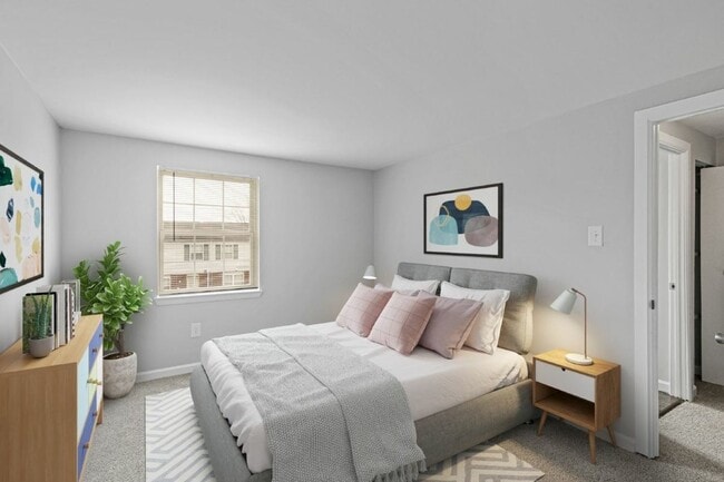 furnished-bedroom-Village-of-Carrollwood - Village Of Carrollwood Apartments