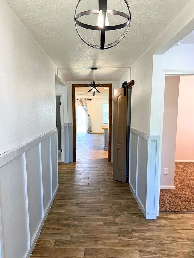 Building Photo - Stylish 4-Bedroom Home with Fenced Yard – Prime Location!