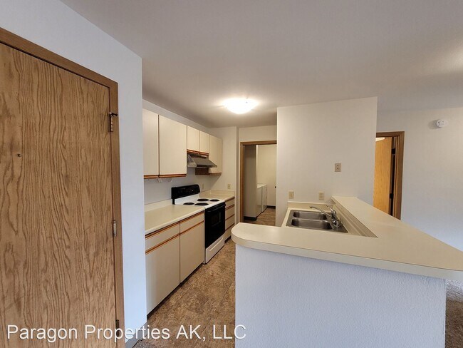Building Photo - 2 br, 1 bath House - 3550 W. Dimond Blvd #203