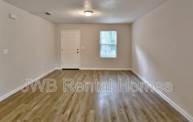 Building Photo - 7823 Dekle Ave