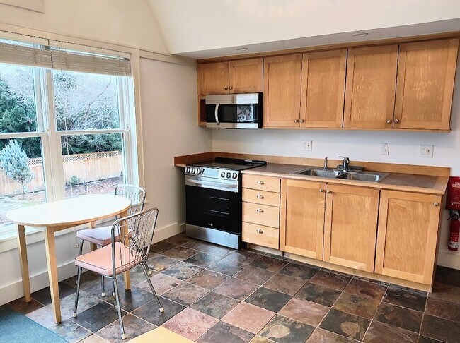 Galley Kitchen, Dining, Newer Stove, Microwave - 411 N Geneva St