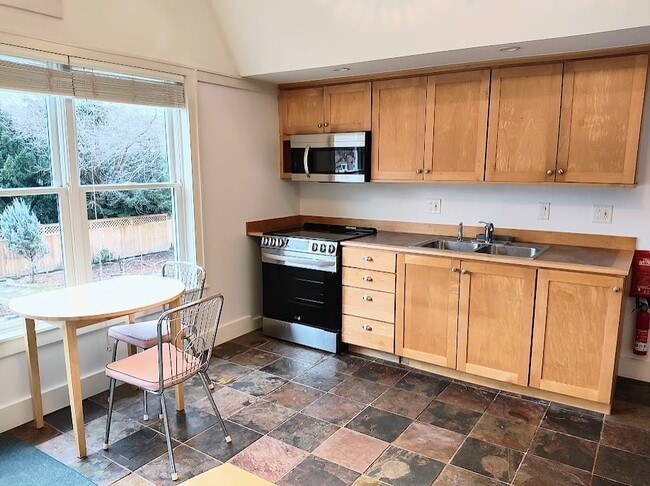 Galley Kitchen, Dining, Newer Stove, Microwave - 411 N Geneva St