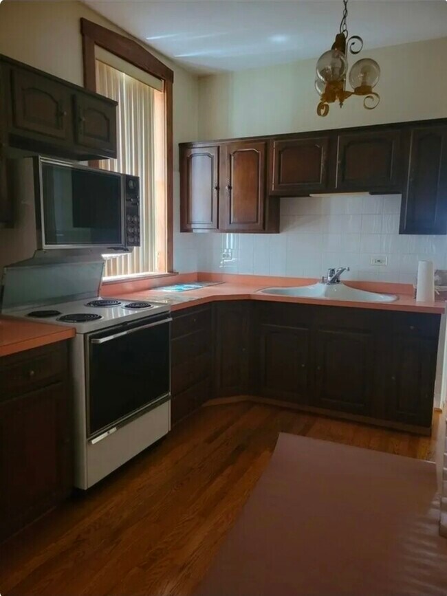 Foto del edificio - 6939 N Hamilton Ave