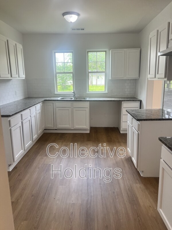 Building Photo - 309 Iota Ave S