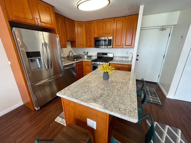 Foto del edificio - Skyline Living | Furnished 2-Bedroom with ...