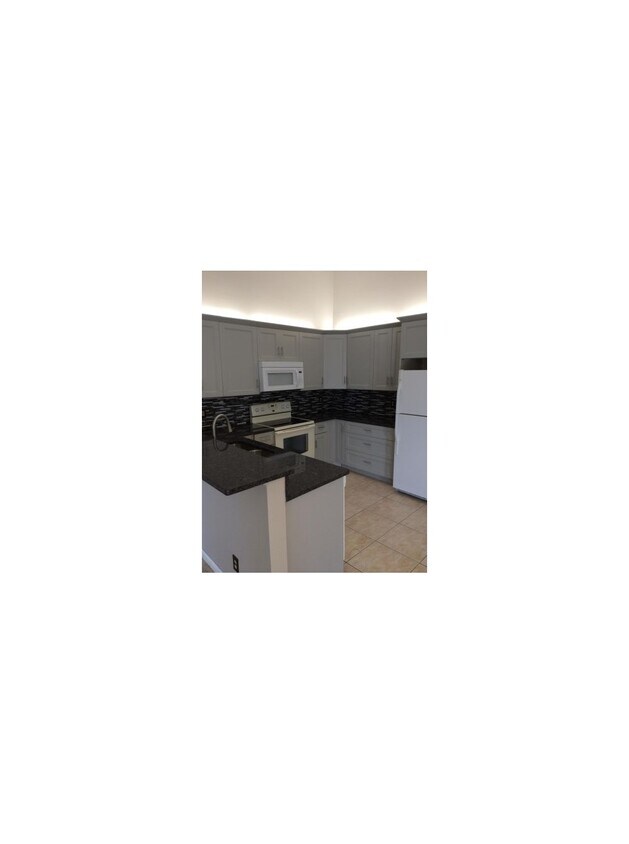 4383 Woodstock Dr, West Palm Beach, FL 33409 Townhome Rentals in West
