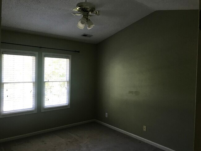 Master Bedroom with cathedral ceiling - 208 Martins Point Pl