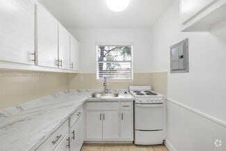 Building Photo - 7130 W 11th Ct