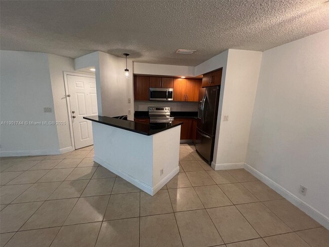 Foto del edificio - 3410 Pinewalk Dr N