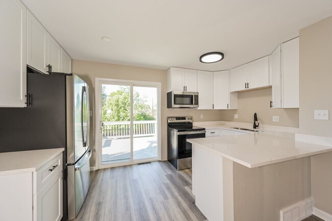 Building Photo - "Charming 4-Bedroom Home with 2 Full Baths...
